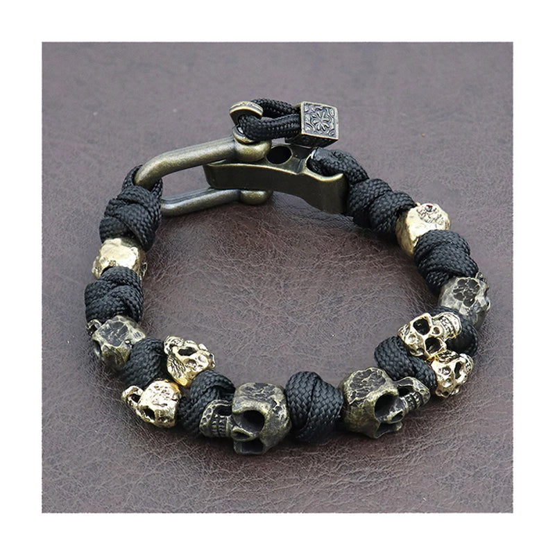 Bracelet pirate ajustable têtes de mort en métal façon vintage étain avec corde noire à fermeture solide Trésors de Pirate